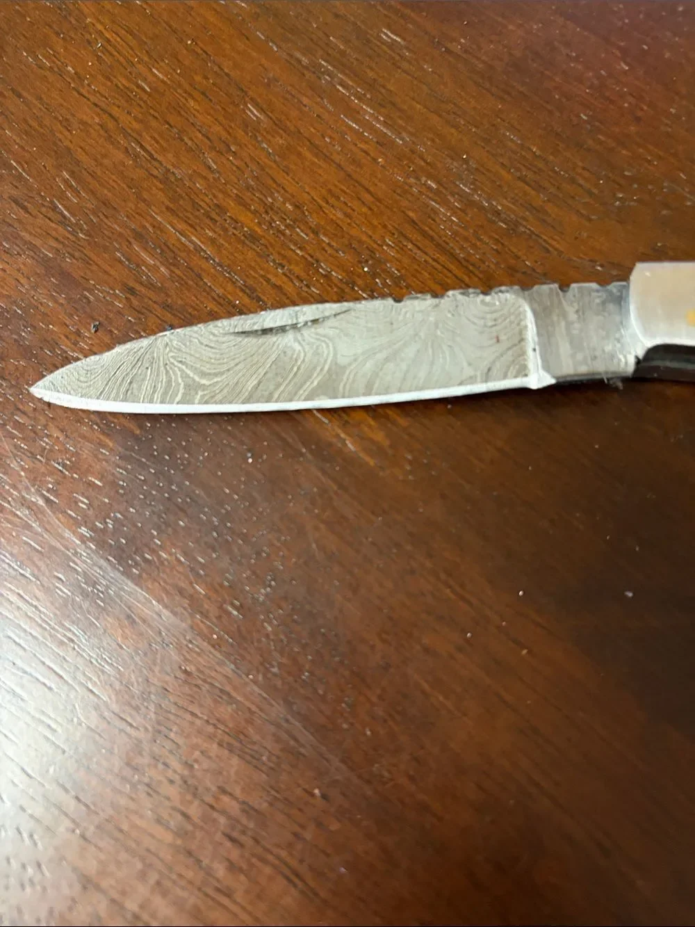 Hand crafted 8” folding Damascus steel